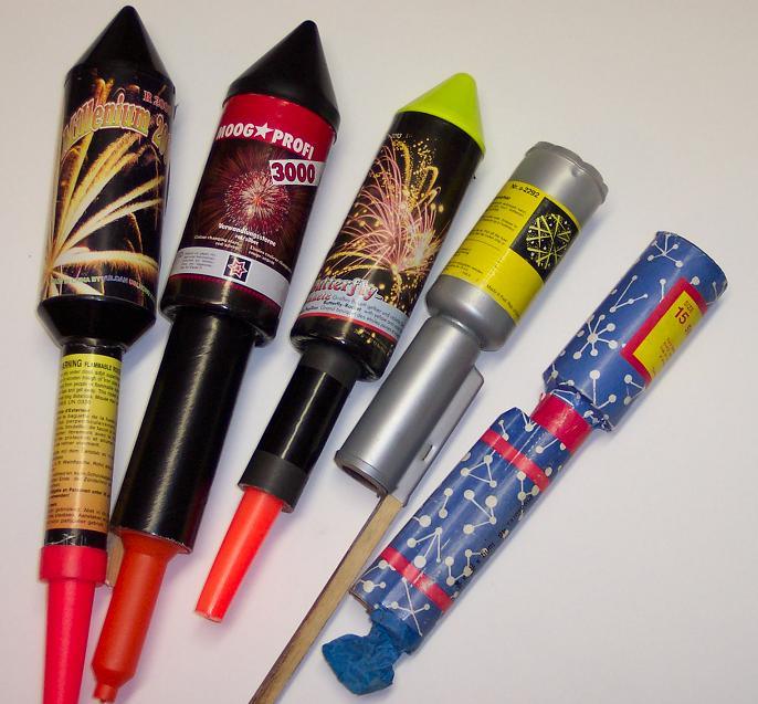 A VARIED COLLECTION OF FIREWORK PHOTOGRAPHS, ADVERTS AND DUMMIES